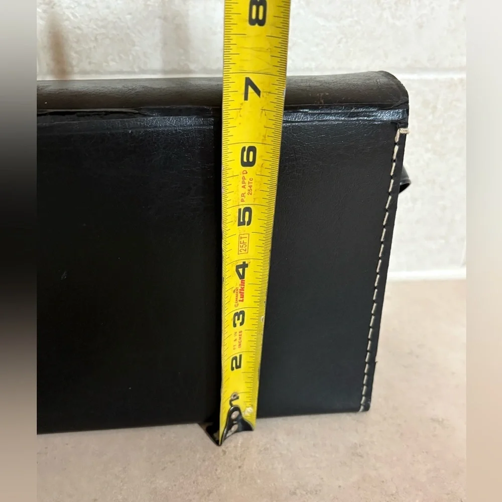 Vintage Polaroid Swinger camera and case